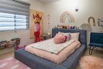 Kids room 1 with a queen bed and a private bathroom